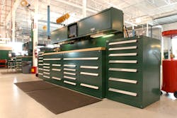 Vidmar&apos;s &apos;Rotunda&apos; inventory control system consists of four Vidmar cabinets with a total of 52 tool drawers, plus overhead cabinets for bulk storage.