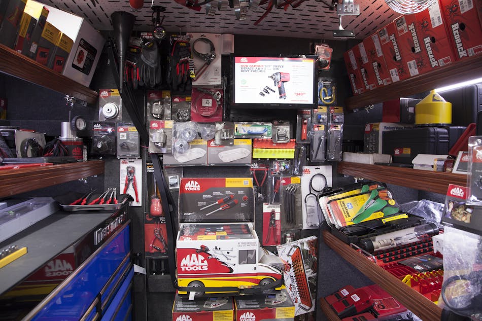 Pop-up display. This pop-up display, currently featuring a screwdriver set, showcases a specific product Ortiz has available on the truck. He complements the specials included in this pop-up by featuring a video about the product on the TV behind the display.