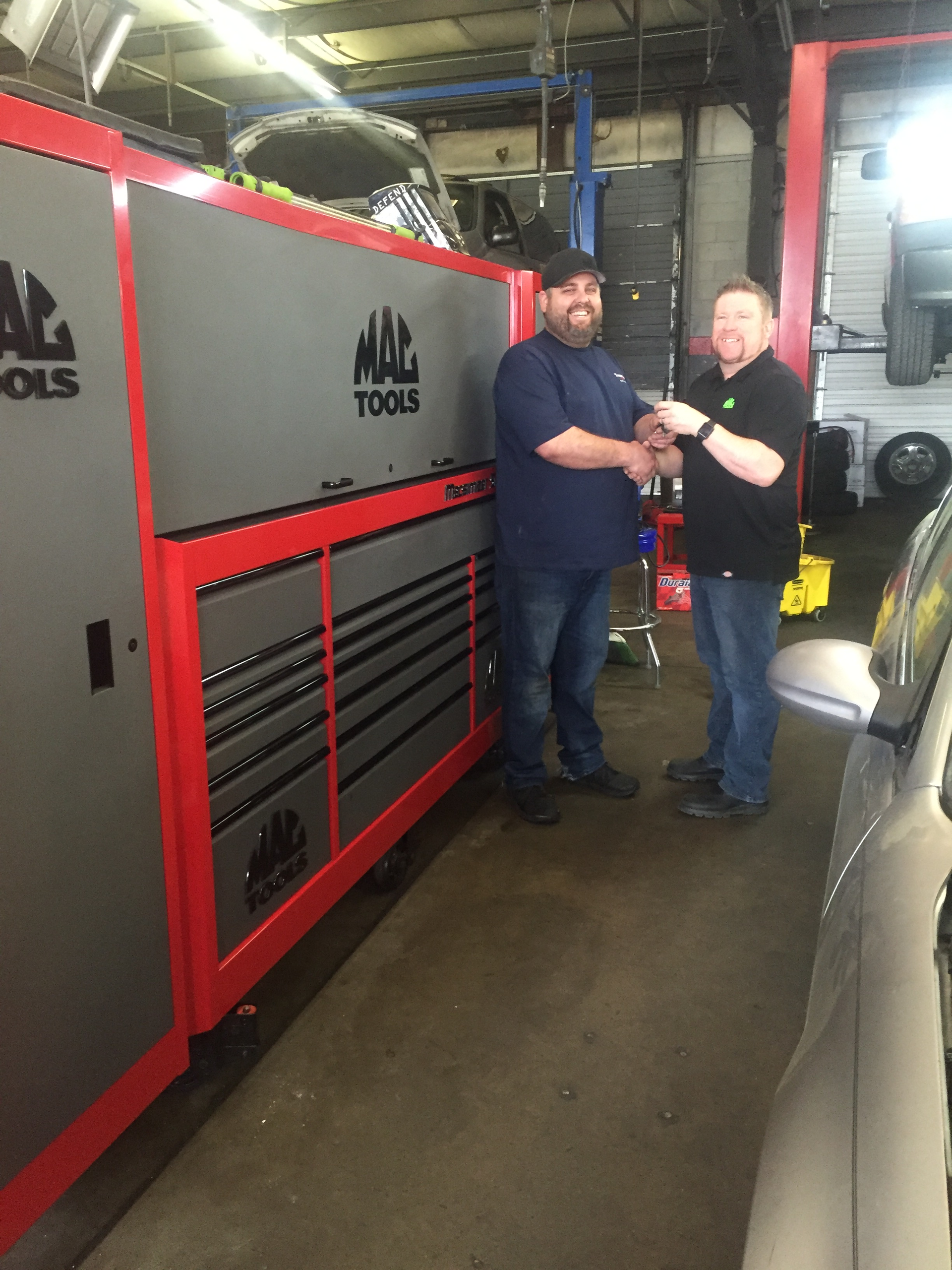 Chesapeake Va.-based Mac Tools distributor Nigel Clarke (on right) has excelled at selling toolboxes and tool storage solutions during his time in business.