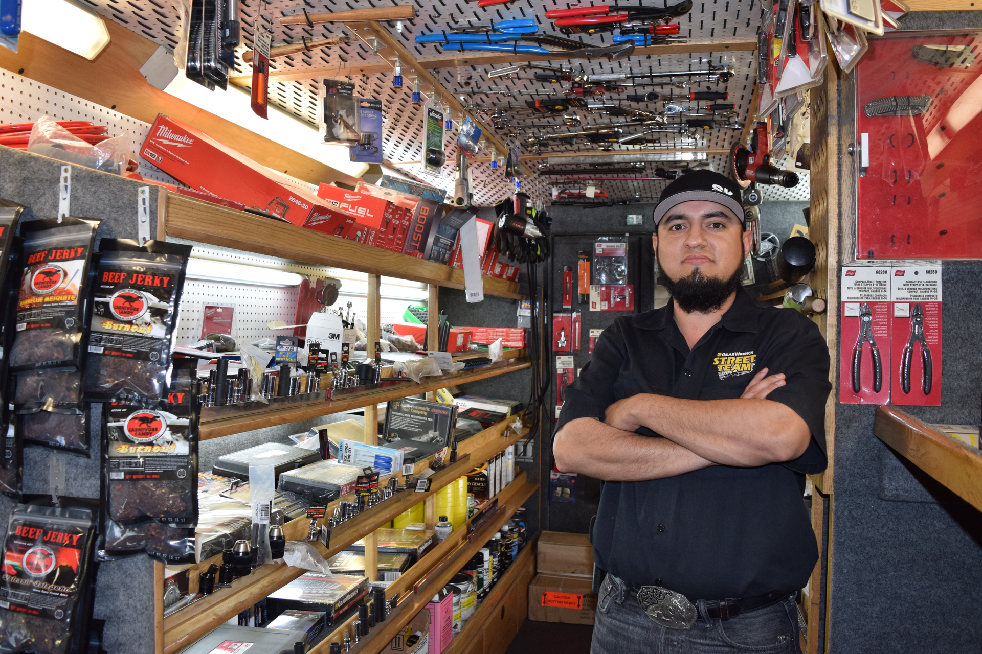 Alfredo Velasco, owner of The Right Tool LLC and Velasco Tools Enterprise, stands in his truck.