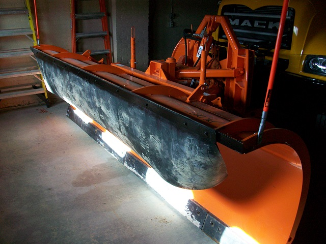 Rolls of old conveyor belting can be repurposed by cutting to length and installing it as a poor man&rsquo;s snowplow blade deflectors.