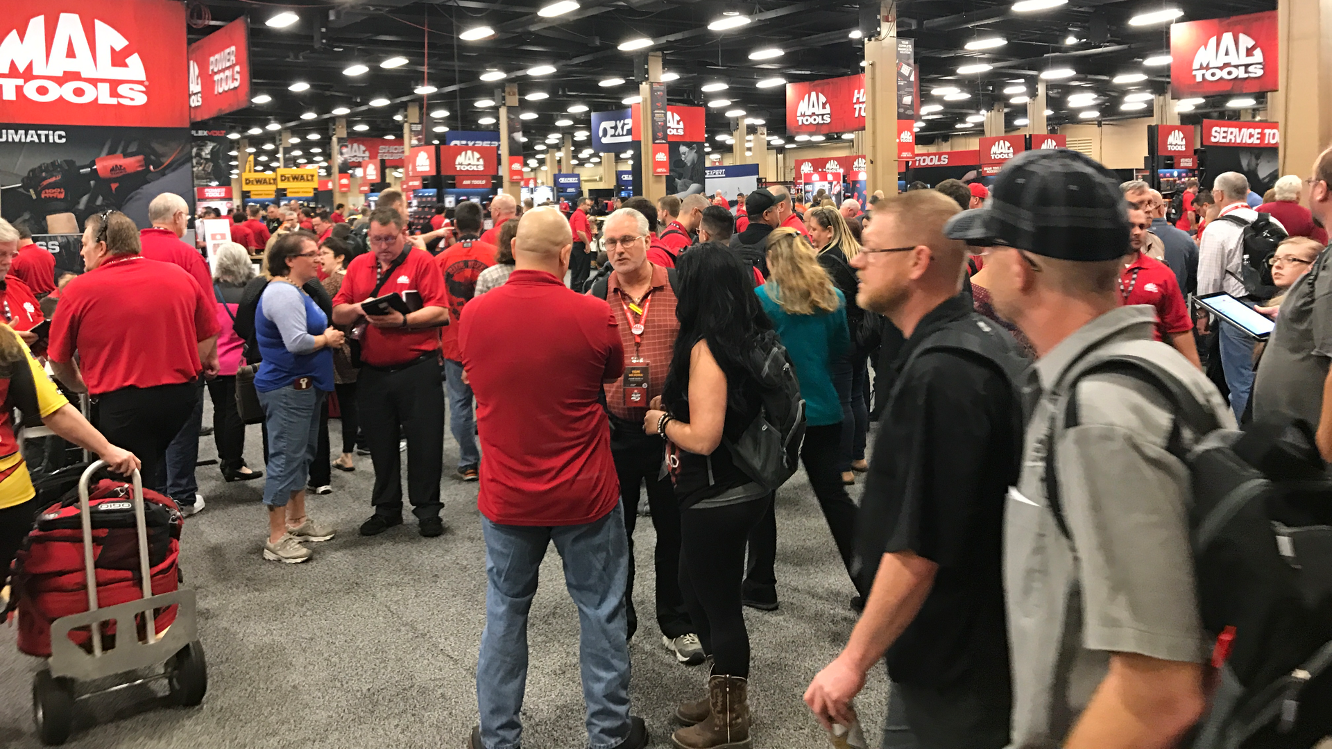 Distributors enter the show floor at the start of the show during the 2017 Mac Tools Tool Fair.