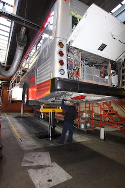 Servicing Bus On An Inground Rotary Lift 595e80320b424