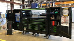 This black and green Matco RevelX Series toolbox features a hutch and two side lockers. This black and green Matco RevelX Series toolbox features a hutch and two side lockers.