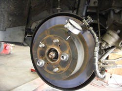 This image illustrates using a dial indicator to check for hub or rotor run out. This image illustrates using a dial indicator to check for hub or rotor run out.