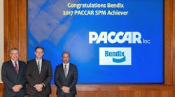 Shown left to right at the PACCAR SPM Award presentation are Bill Jackson, PACCAR vice president, global purchasing; Berend Bracht, Bendix president and CEO; and Rogier van de Garde, PACCAR senior director, purchasing.