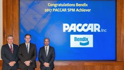 Shown left to right at the PACCAR SPM Award presentation are Bill Jackson, PACCAR vice president, global purchasing; Berend Bracht, Bendix president and CEO; and Rogier van de Garde, PACCAR senior director, purchasing.