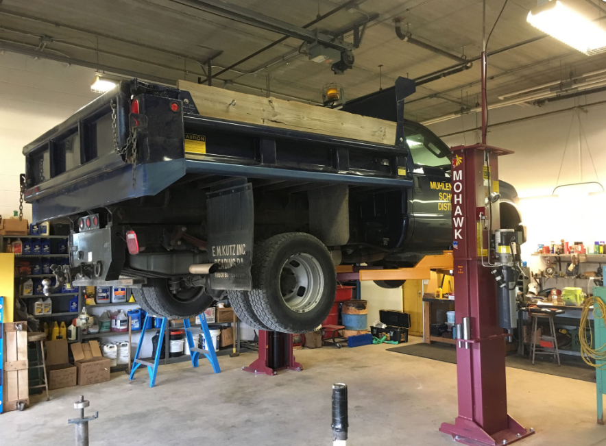 Two-post lifts range in capacities from 6,000 to 30,000 lbs. It is important to note that while the full weight of the vehicle may fit these parameters, it is critical to determine if the weight is distributed evenly. For instance, the bulk of a work truck load may be at the rear of the vehicle while the lift is raised.