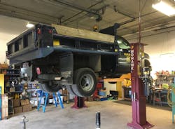 Two-post lifts range in capacities from 6,000 to 30,000 lbs. It is important to note that while the full weight of the vehicle may fit these parameters, it is critical to determine if the weight is distributed evenly. For instance, the bulk of a work truck load may be at the rear of the vehicle while the lift is raised. Two-post lifts range in capacities from 6,000 to 30,000 lbs. It is important to note that while the full weight of the vehicle may fit these parameters, it is critical to determine if the weight is distributed evenly. For instance, the bulk of a work truck load may be at the rear of the vehicle while the lift is raised.