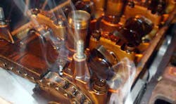 Injecting smoke into the spark plug hole is what found the bad piston. Injecting smoke into the spark plug hole is what found the bad piston.