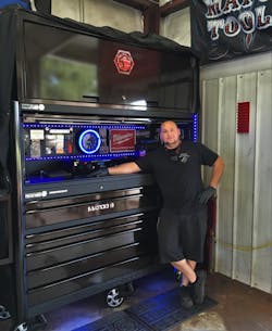 Chris Barnes of Black Cat Auto and Diesel with his custom Matco toolbox. Chris Barnes of Black Cat Auto and Diesel with his custom Matco toolbox.