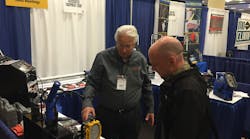 Gary Mackey of Associated Equipment demonstrates one of the company&apos;s products at a Cornwell Quality Tools rally.