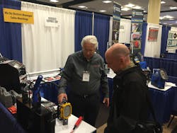 Gary Mackey of Associated Equipment demonstrates one of the company&apos;s products at a Cornwell Quality Tools rally.