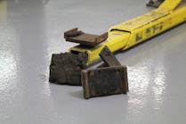 To improve bay safety, technicians should get to know their lifts by truly paying attention to potential safety hazards or damage to the lift and its accessories. For example, it is important to check lift contact points such as lifting pads to make sure they are free of debris, grease, oil, and anything else that may prevent solid contact. Adapters in the condition shown here should not be used.