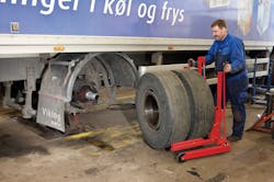 A high lift wheel dolly allows wheel removal without back strain. A high lift wheel dolly allows wheel removal without back strain.