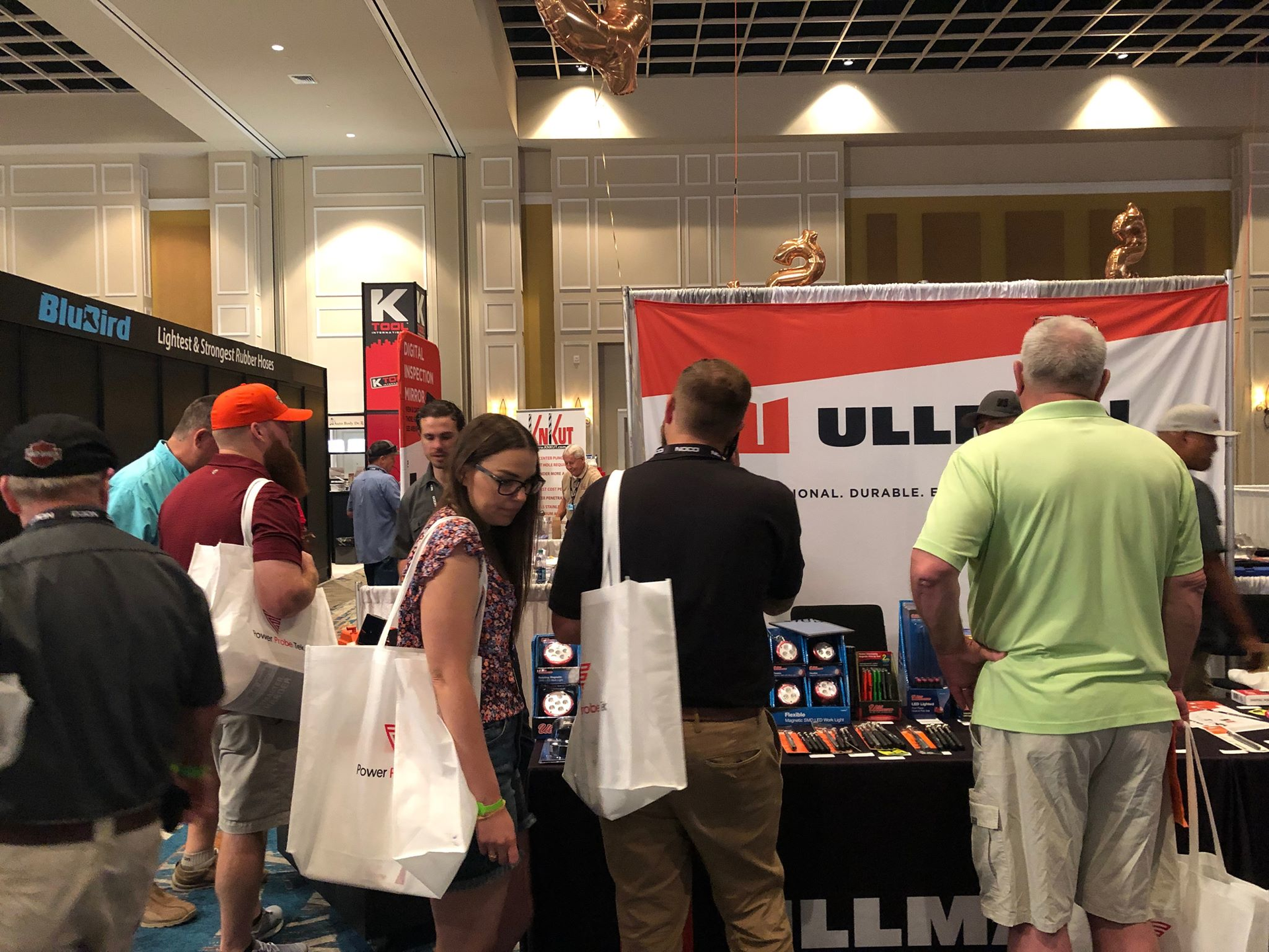 Ullman interacting with customers at their booth during the ISN Tool Dealer Expo 2019.