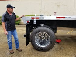 A Velociti representative demonstrates how quickly the MTIS can be retrofitted onto a trailer. A Velociti representative demonstrates how quickly the MTIS can be retrofitted onto a trailer.