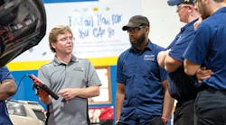 Alfred State College of Technology Instructor Jason Kellogg works with students in a recently rebranded &lsquo;Race to 2026&rsquo; technical training facility at the school.