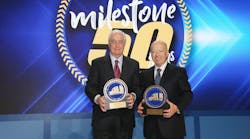 Roger S. Penske, left, chairman of Penske Transportation Solutions, and Brian Hard, president and CEO of Penske Transportation Solutions, pose for a 50th anniversary photo.