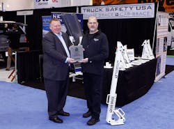 Truck Safety USA's Jamie Hendricks receives The Work Truck Show 2020 Innovation Award, safety category, for the company's Cab Brace, from NTEA President and CEO Steve Carey. Truck Safety USA's Jamie Hendricks receives The Work Truck Show 2020 Innovation Award, safety category, for the company's Cab Brace, from NTEA President and CEO Steve Carey.