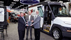 Morgan Olson&apos;s Rich Tremmel, vice president of sales and marketing, and Mark Hope, vice president of engineering, receive The Work Truck Show 2020 Innovation Award, body concept category, for the company&apos;s Class 2 Storm step van, from NTEA President and CEO Steve Carey.