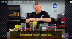 Dave Hobbs demonstrating a field test of the Class-Zero rated gloves. These gloves are the personal protection equipment (PPE) used to insulate the user safely, up to 1000 VAC, and can only do so effectively if no holes exist. Dave is seen here filling the gloves with air to check for leaks. Dave Hobbs demonstrating a field test of the Class-Zero rated gloves. These gloves are the personal protection equipment (PPE) used to insulate the user safely, up to 1000 VAC, and can only do so effectively if no holes exist. Dave is seen here filling the gloves with air to check for leaks.