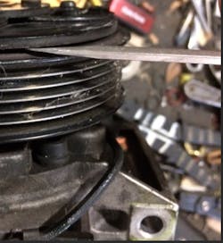 Figure 7 &mdash; This picture demonstrates how excessive the compressor clutch gap was and shows the root cause of the customer&apos;s symptom (A/C inoperable after hot-soak).