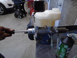 Figure 3 - Bleeding a master cylinder using a bleeding kit with one-way check valves. Figure 3 - Bleeding a master cylinder using a bleeding kit with one-way check valves.