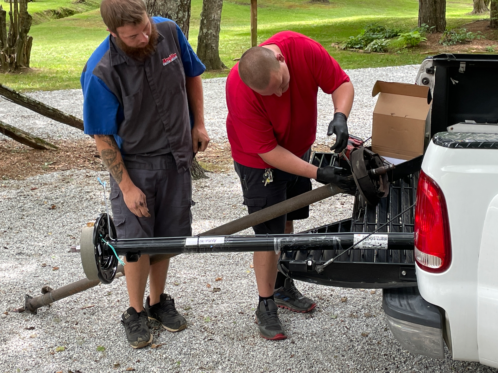 Anglin techs Stacey (left) and Brandon (right) fitted the new axle on site and had us up and running in a few hours.