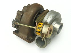 The Garrett AiResearch T3 turbocharger was developed at the company’s facilities in Torrance, California, in the 1980s. The T3 was exclusively used for automotive applications—the Saab 900 Turbo is one example. The wastegate actuator, attached to the compressor housing, controls boost pressure. The Garrett AiResearch T3 turbocharger was developed at the company’s facilities in Torrance, California, in the 1980s. The T3 was exclusively used for automotive applications—the Saab 900 Turbo is one example. The wastegate actuator, attached to the compressor housing, controls boost pressure.