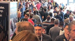 A large crowd wades through the SEMA Show in 2019.