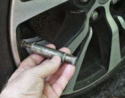 Figure 1: This 112, year-old tire gauge operates using a sliding scale under spring tension to measure tire pressure. The Schrader-Universal tire gauge was patented in 1909 and manufactured by A. Schrader Son's Inc. in Brooklyn, New York. Figure 1: This 112, year-old tire gauge operates using a sliding scale under spring tension to measure tire pressure. The Schrader-Universal tire gauge was patented in 1909 and manufactured by A. Schrader Son's Inc. in Brooklyn, New York.