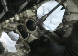 Figure 6- Some manufacturers don’t offer any preventive countermeasures to battle carbon buildup. When severe driveability symptoms surface because of carbon buildup, removal of the cylinder head for carbon cleaning is the procedure called upon in the service information. Figure 6- Some manufacturers don’t offer any preventive countermeasures to battle carbon buildup. When severe driveability symptoms surface because of carbon buildup, removal of the cylinder head for carbon cleaning is the procedure called upon in the service information.
