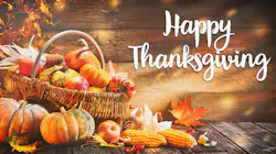 Thanksgiving basket with written words Happy Thanksgiving