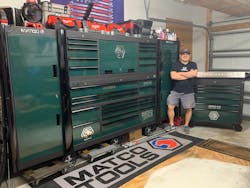 Andrew Kay, automotive technician, stands in front of his Matco Tools toolbox