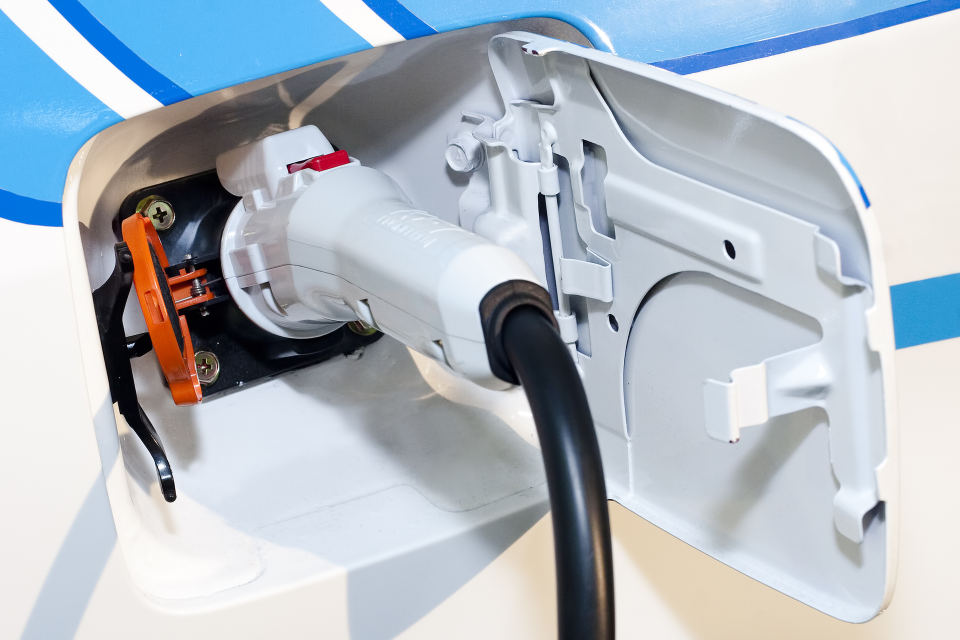 Close up of electric vehicle being charged