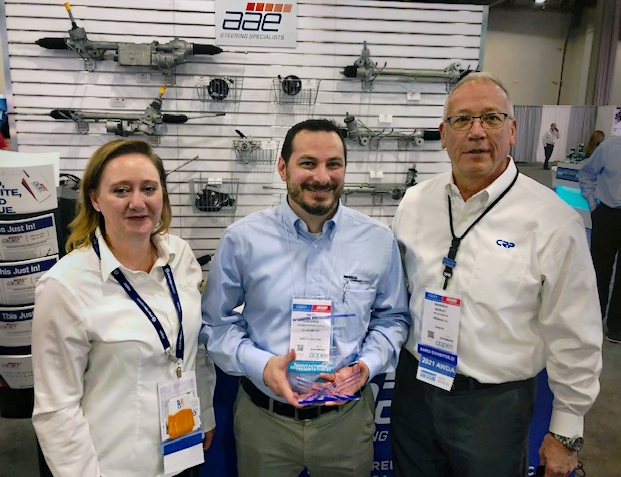 CRP Automotive Channel Sales Manager Nicole Ryan and U.S & Canada Sales Director Warren Morley (right) presented Matt Zarlenga with the 2021 U.S. Sales Representative of the Year Award.