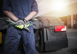 Technician with a wrench Technician with a wrench