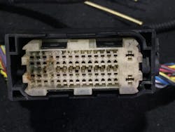 A connector to the engine control unit that has damage to the terminals. A connector to the engine control unit that has damage to the terminals.