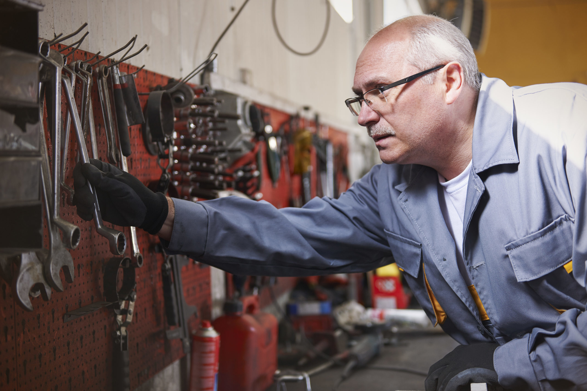 Mechanic with tools workshop