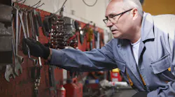 Mechanic with tools workshop Mechanic with tools workshop