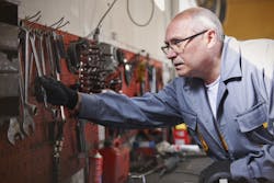 Mechanic with tools workshop Mechanic with tools workshop