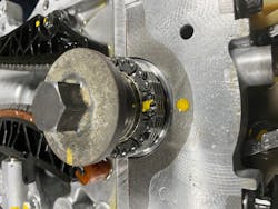 Figure 6: The engine rebuilder disassembled the engine to prove the crankshaft timing mark was properly referenced during initial reassembly. Figure 6: The engine rebuilder disassembled the engine to prove the crankshaft timing mark was properly referenced during initial reassembly.