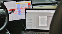 Figure 1 – Tesla vehicle undergoing diagnostic tests