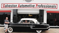 John and Lynn Eanes, owners of Galveston Automotive Professionals in Galveston, Texas, show off the Packard they recently serviced.