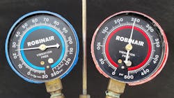 Figure 8 - Manifold gauge readings with a restriction at the discharge line between the condenser and the high side service port. Ambient temperature 82 degF.