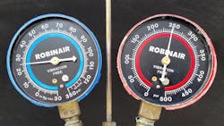 Figure 8 - Manifold gauge readings with a restriction at the discharge line between the condenser and the high side service port. Ambient temperature 82 degF. Figure 8 - Manifold gauge readings with a restriction at the discharge line between the condenser and the high side service port. Ambient temperature 82 degF.