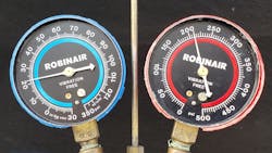 Figure 9: Manifold gauge readings with a restriction at the suction side between the evaporator core and the low side service port. Ambient temperature 82 degrees F. Figure 9: Manifold gauge readings with a restriction at the suction side between the evaporator core and the low side service port. Ambient temperature 82 degrees F.