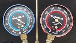 FIG 7: Manifold gauge readings with a restriction at the suction line between the compressor and the low-side service port. Ambient temperature 82 degrees F. FIG 7: Manifold gauge readings with a restriction at the suction line between the compressor and the low-side service port. Ambient temperature 82 degrees F.