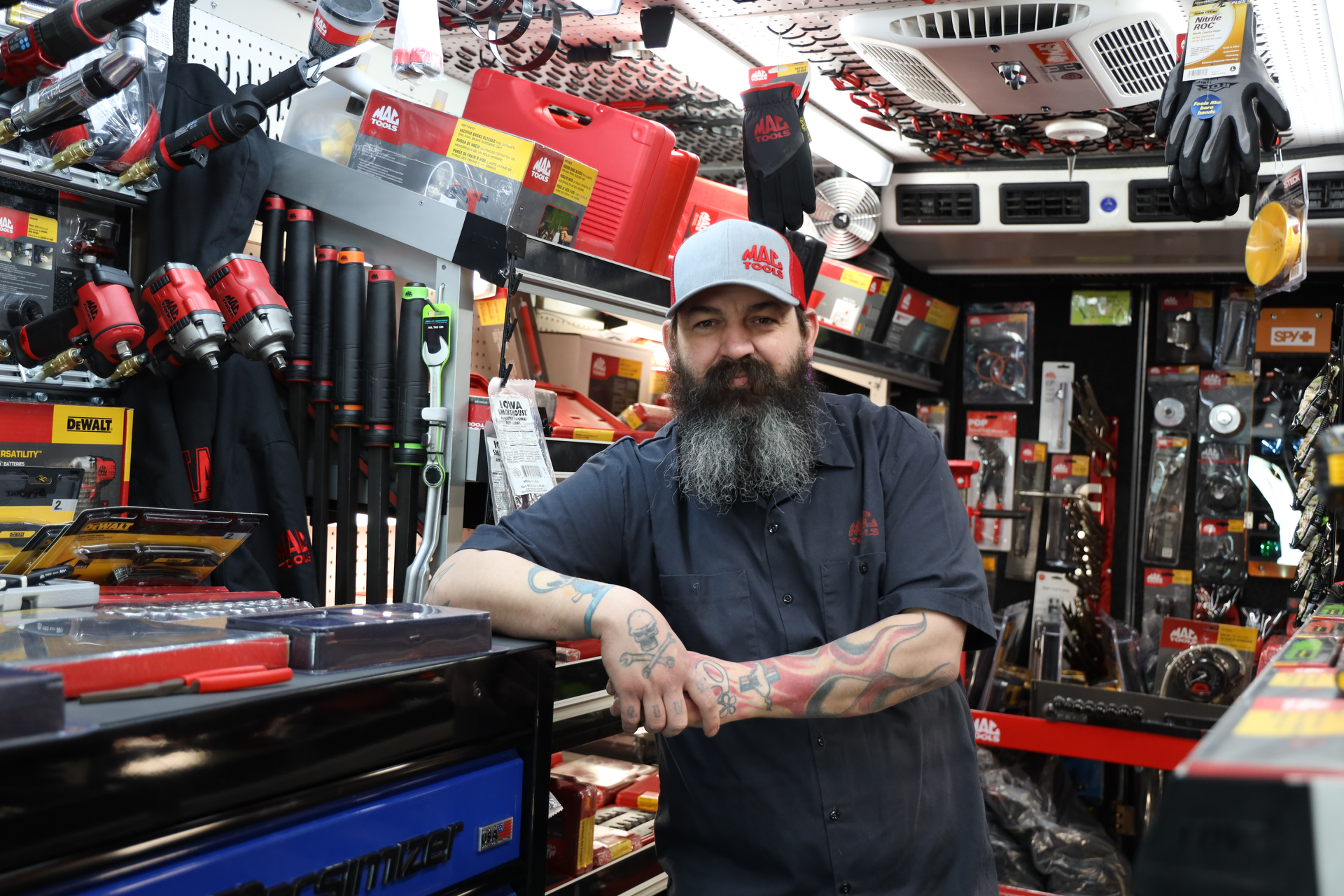 Cody Pick, a Mac Tools dealer, poses in his tool truck